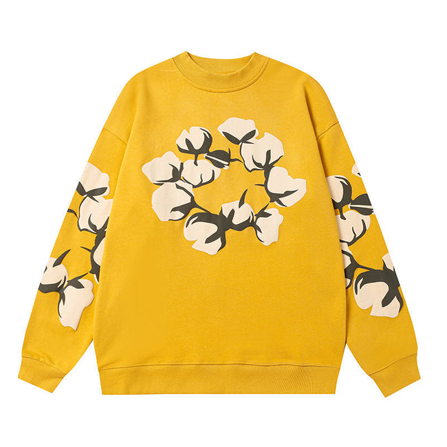 Denim Tears Yellow Crewneck Sweatshirt Front Floral Wreath Hover Image